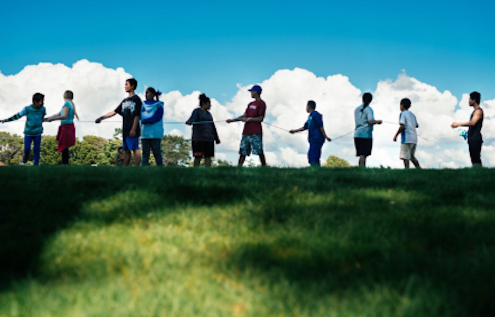 Picture of teenagers lined up outside